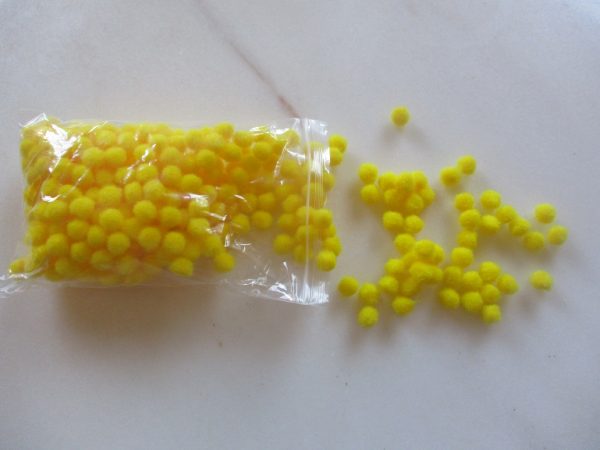 Petits pompons jaune 10 mm